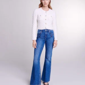 Vaqueros flare con bolsillos bordados