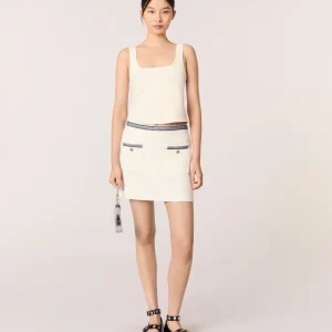 Falda corta con pasamanos contrastados