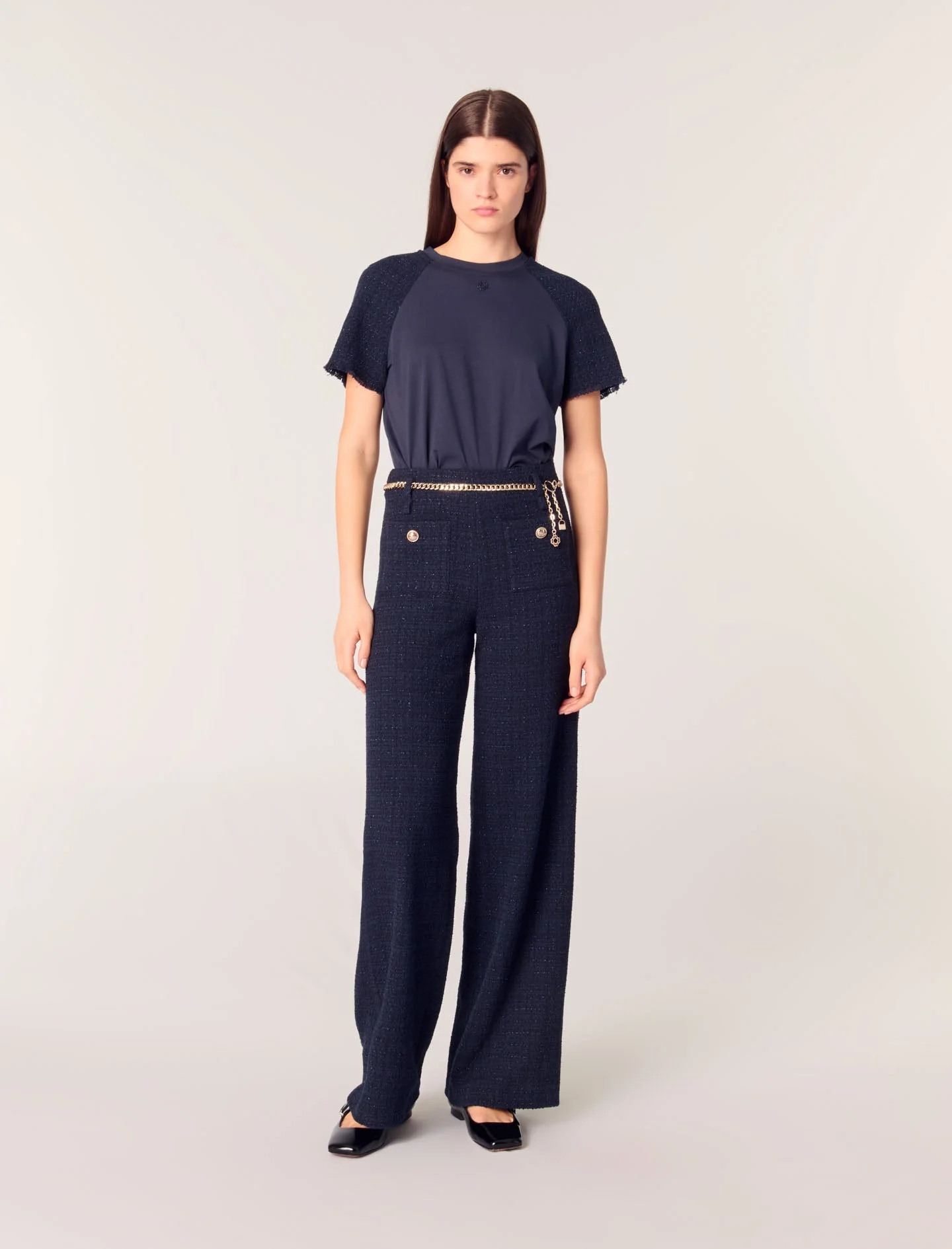 Pantalón tweed con cinturón cadena