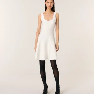 Vestido corto de punto y lentejuelas