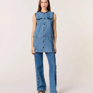 Vestido vaquero y pasamanos bordados