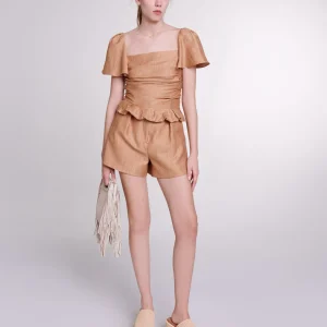 Top de lino con volantes