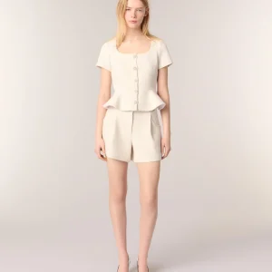 Top peplum de tweed y lurex