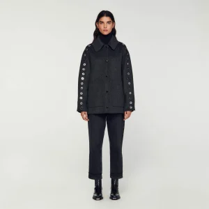 Abrigo oversize con ojales