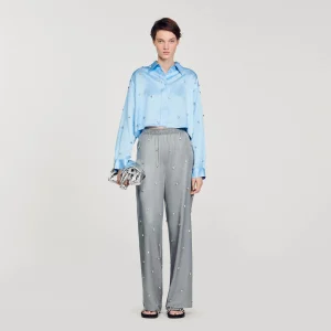 Pantalón de lino con detalle de strass