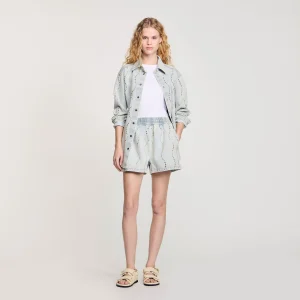 Vaquero corto con strass y perlas