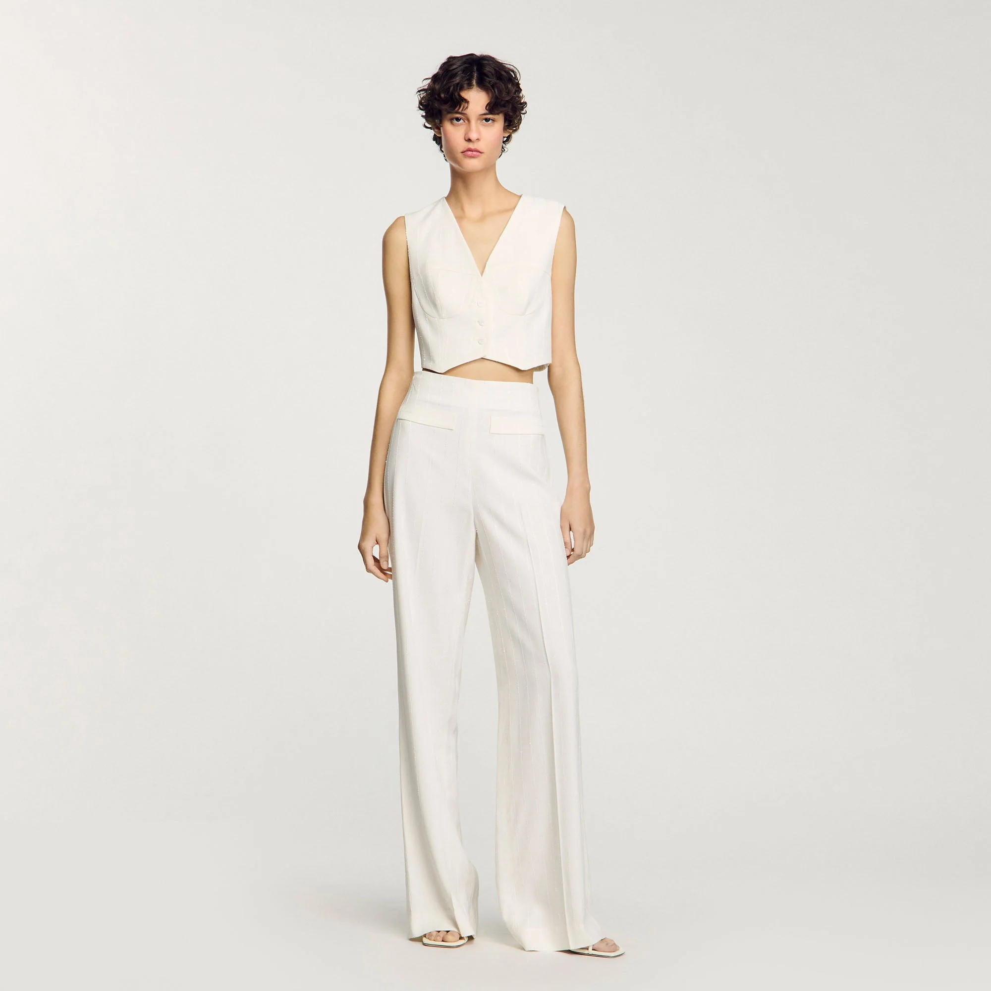 Chaleco corto con lentejuelas